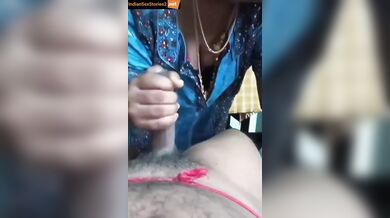 Kannada kamwali showing cleavege and giving handjob