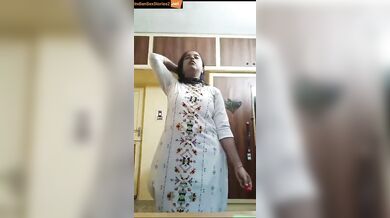 Homealone and bored housewife doing sexy stripping in video call