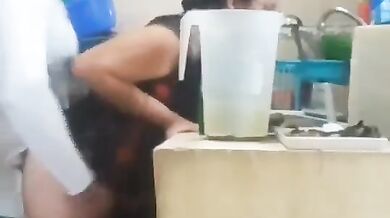 Indian milf aunty fucked by young nephew in the kitchen