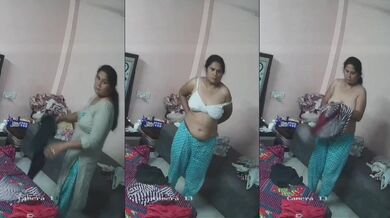 Desi busty Bhabhi dress change caught in cctv