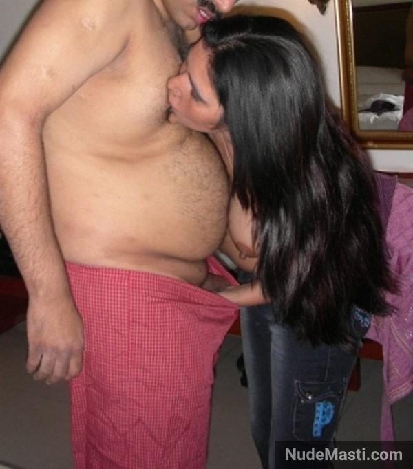 Sexy Indian aunty sucking husband's nipple